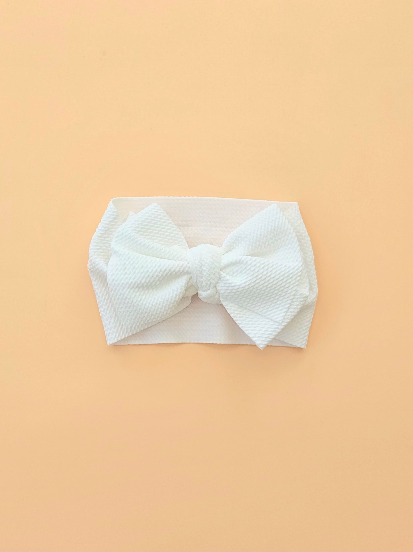 THE CHUNKY BOW HEAD BAND