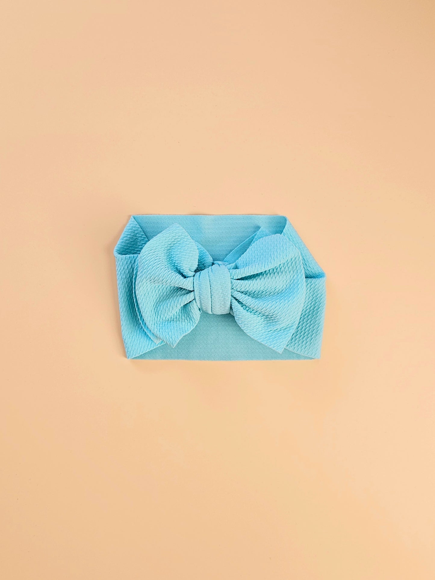 THE CHUNKY BOW HEAD BAND