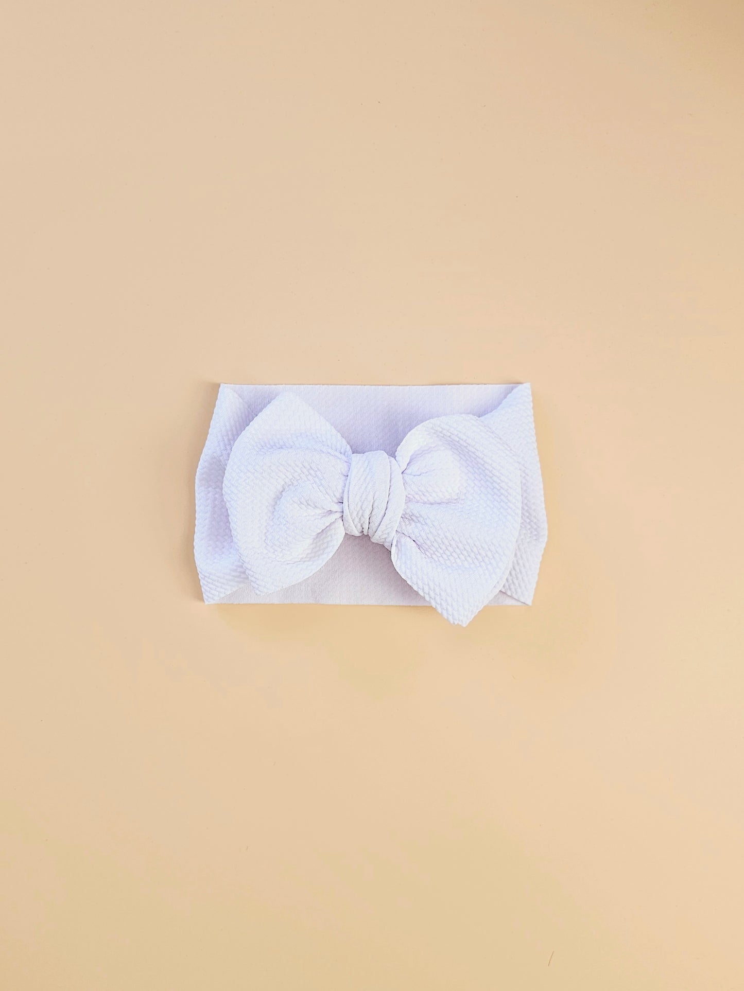 THE CHUNKY BOW HEAD BAND